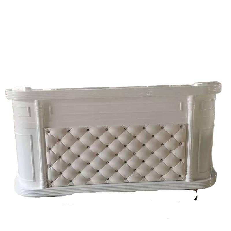 Modern white wall-mounted salon reception desk with minimalist design