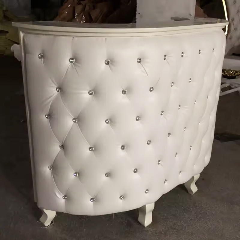 Pink tufted salon reception counter front desk
