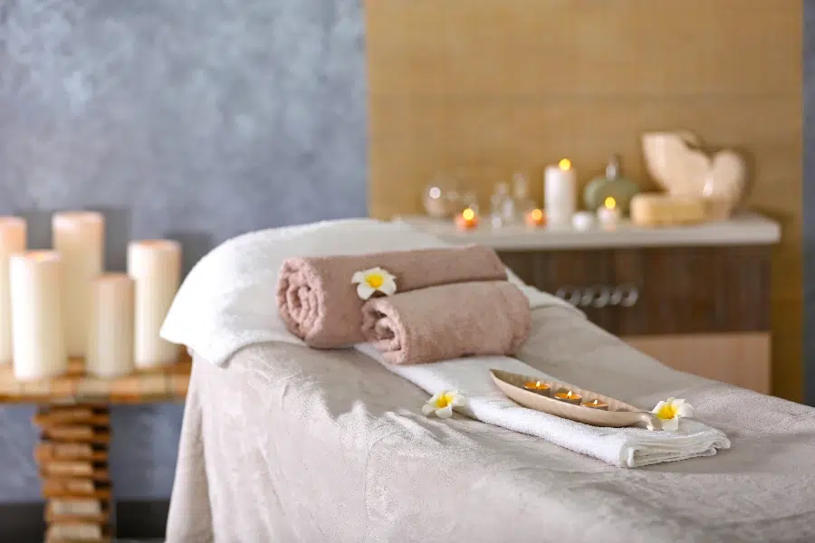 commercial day spa treatment room layout with massage tables and pedicure chairs
