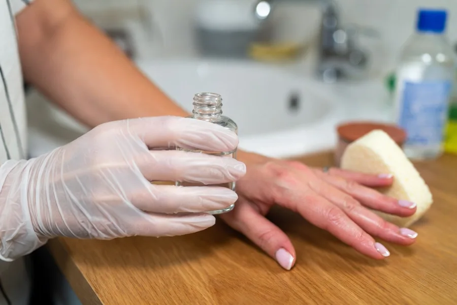 Protecting manicures while doing chores to extend nail life. Nail care advice for long-lasting results.