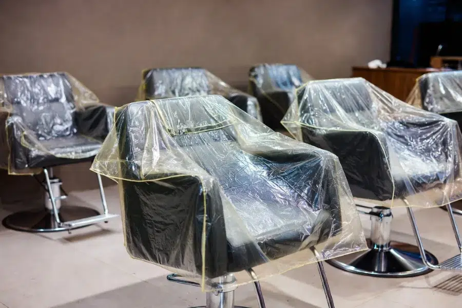 Protecting salon chairs with waterproof covers to extend their life