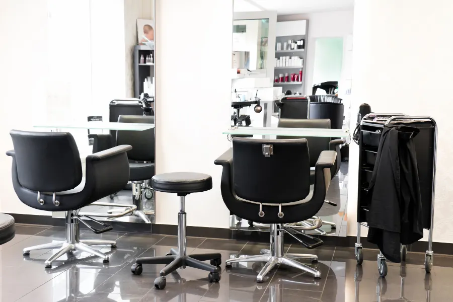 salon aesthetic layout planning with styling stations shampoo area and reception flow