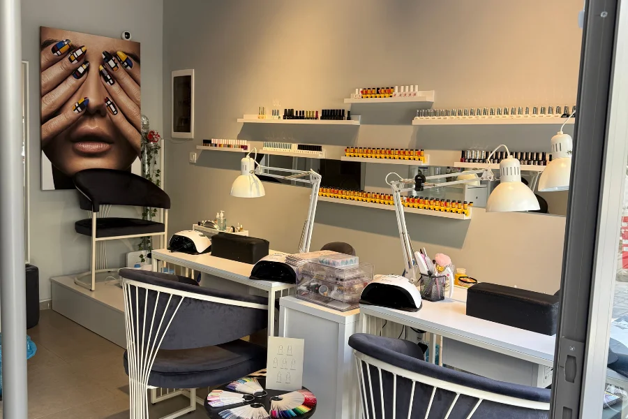 nail salon equipment setup with manicure tables and pedicure chairs designed for efficient workflow