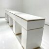 Luxury white manicure table with marble countertop and gold trim, multi-drawer nail salon station