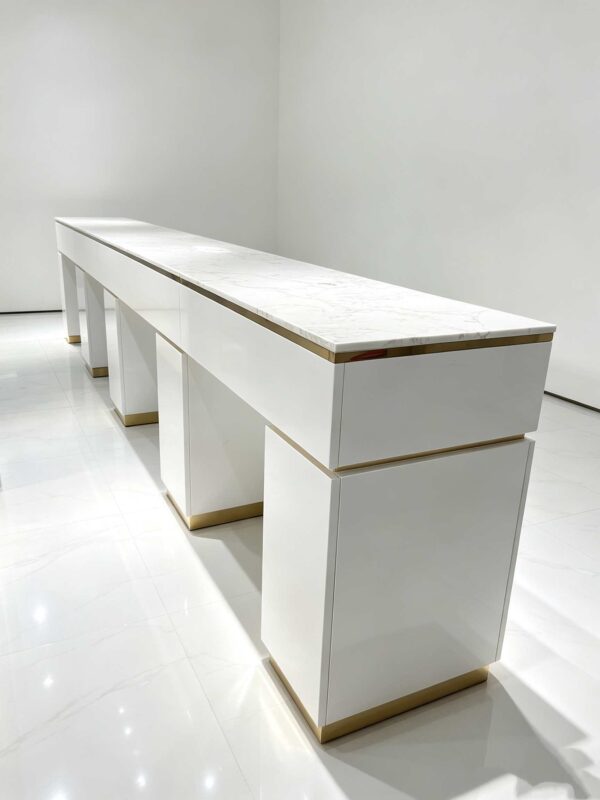 Luxury white manicure table with marble countertop and gold trim, multi-drawer nail salon station